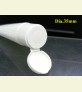 Plastic tube with hinged cap
